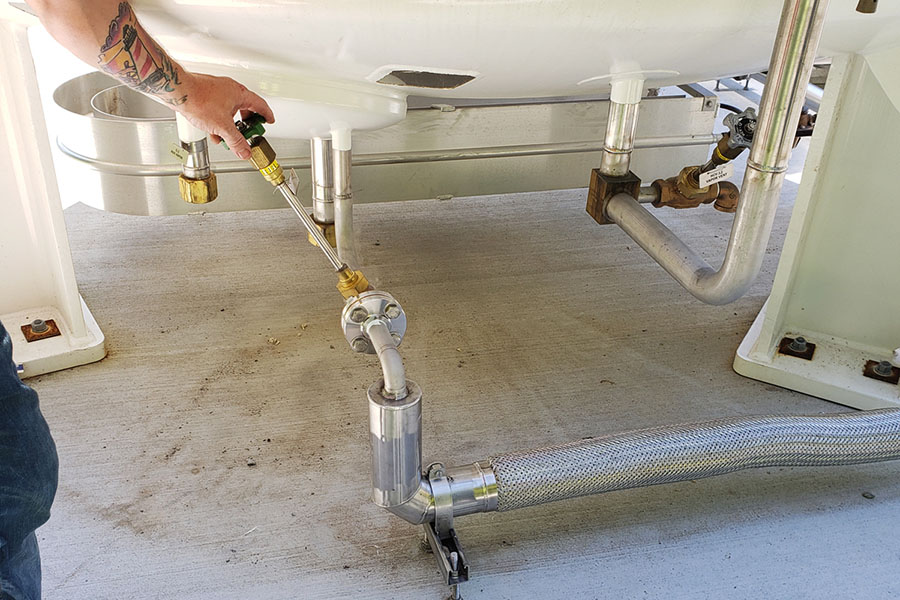 Adjusting the feed lines for the tanks.