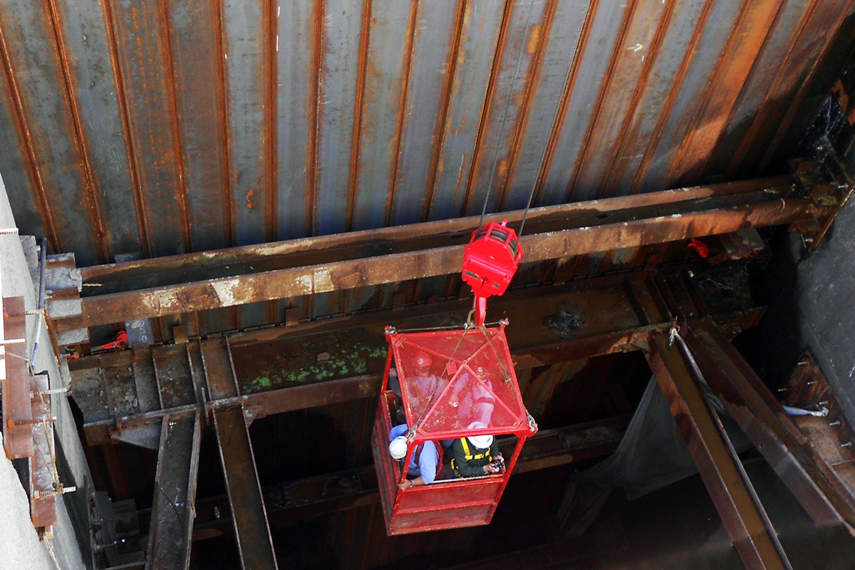 Going down into the cofferdam to install new trash racks