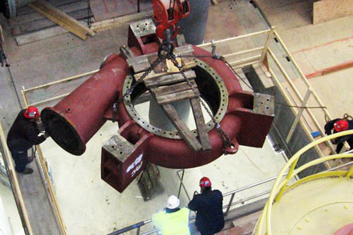 Another view of the pump being lifted out of the pump station