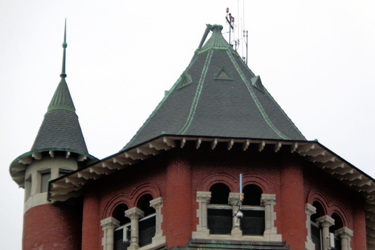 The tower needed serious repair. Note the collapsed and damaged spire at the very top of the tower