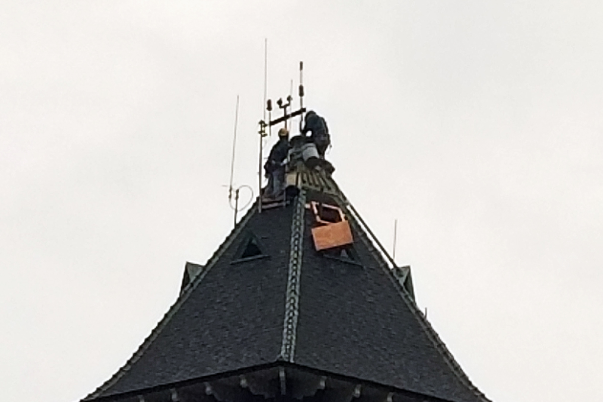 Special safety procedures were required for work on the top of the 157 foot tall tower