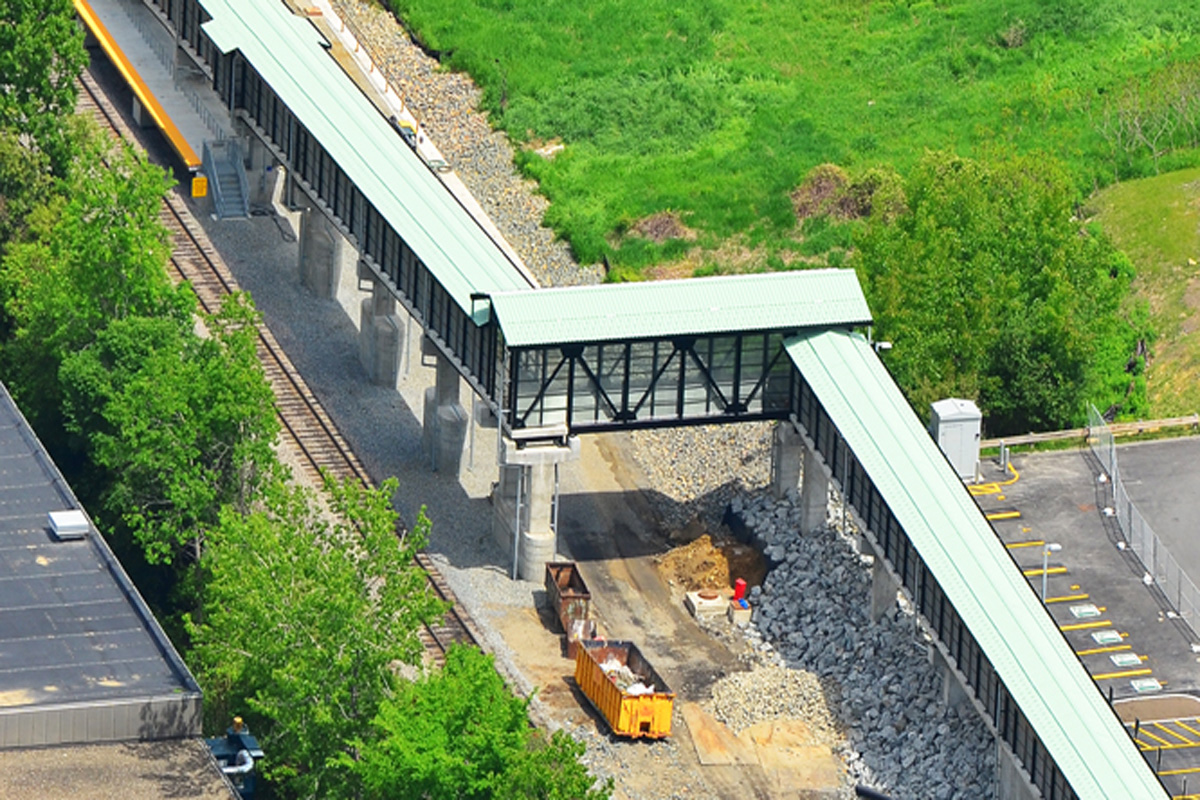 The modular pedestrian bridge connects the two ramp superstructures