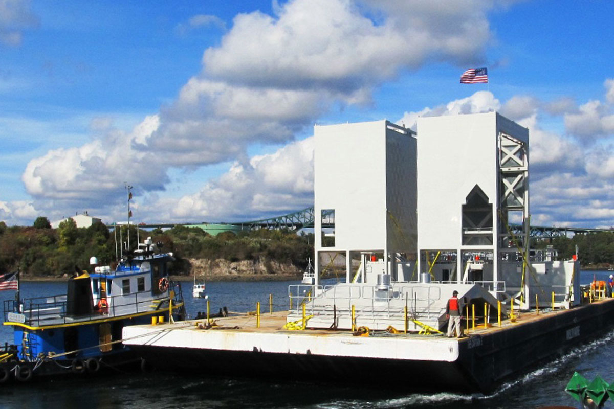 Maintenance Enclosures were transported via barge to the Naval Shipyard
