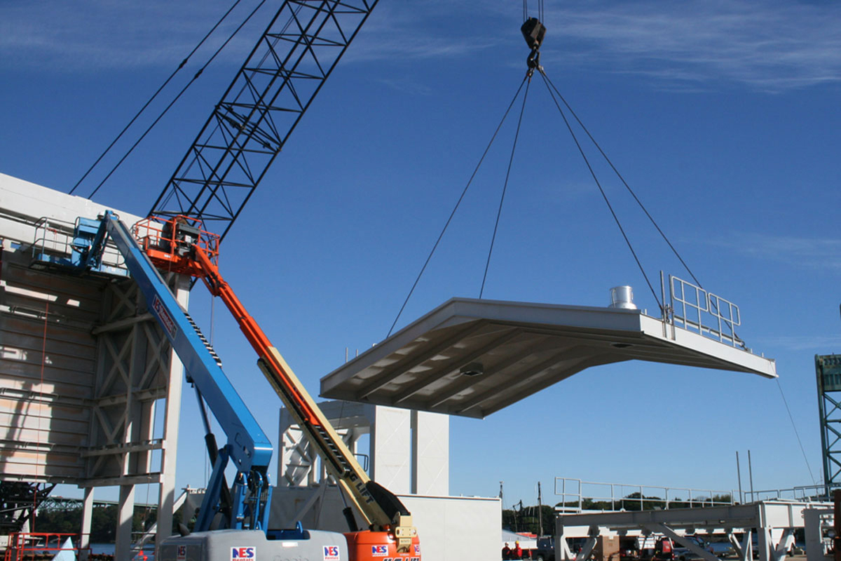 Staging maintenance enclosure roofs for transport to the shipyard