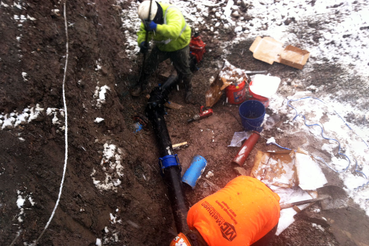 Installing some of the ductile iron force main piping