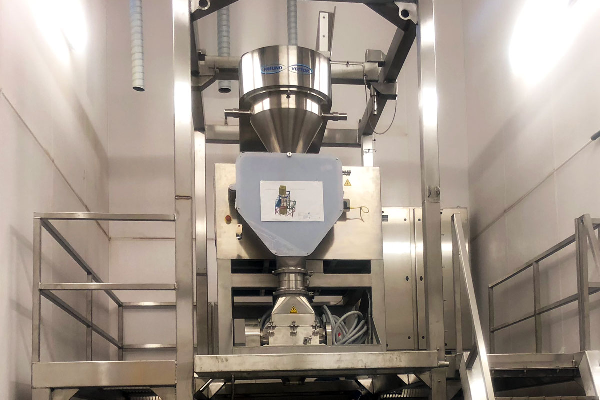 The new food roller press compactor installed in the new stainless steel frame