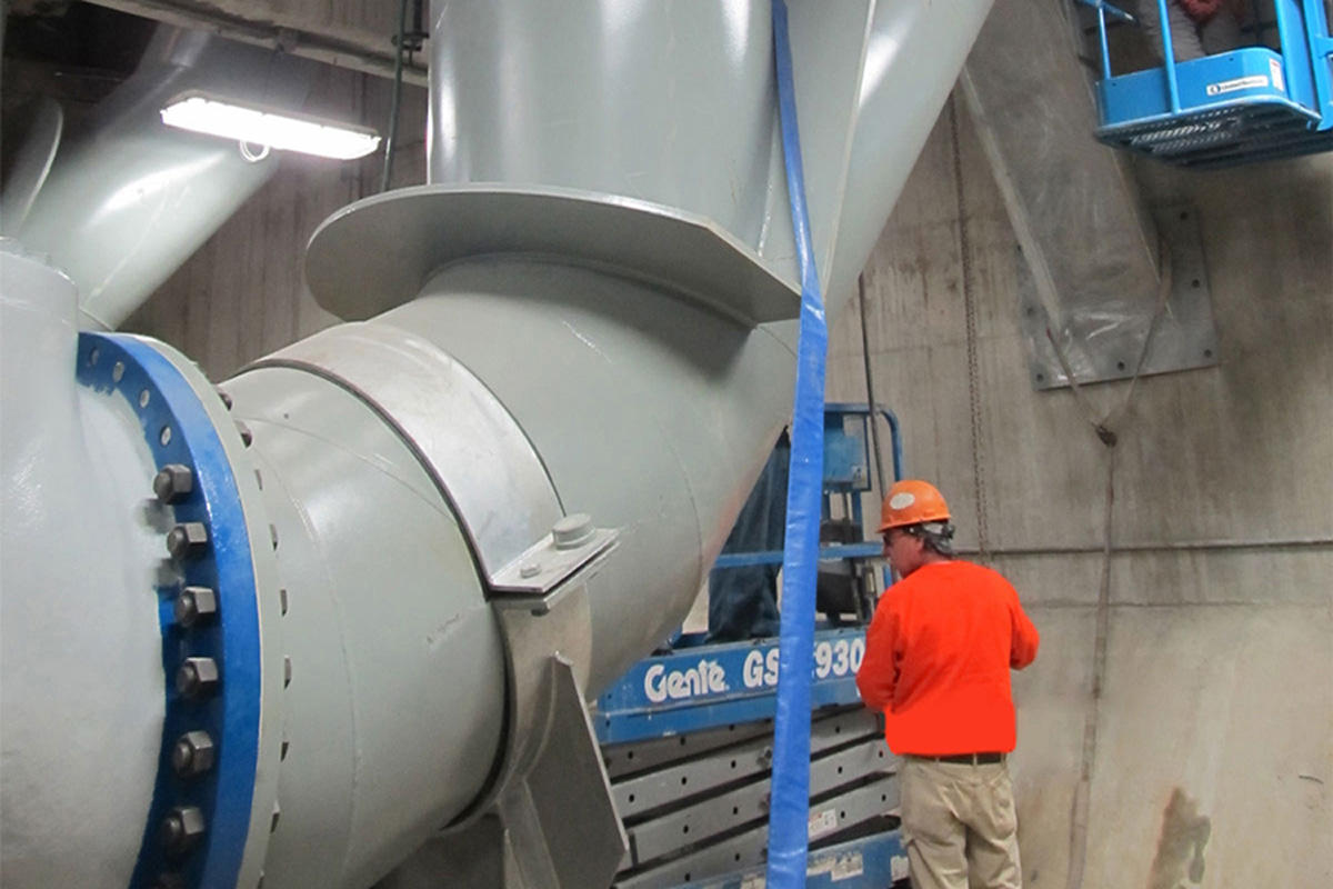 Inspecting pipe inside the Riverside Pump Station