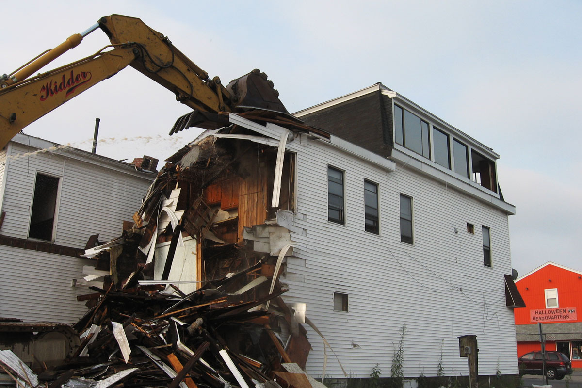 Demolishing the existing building to clear space for the new bank