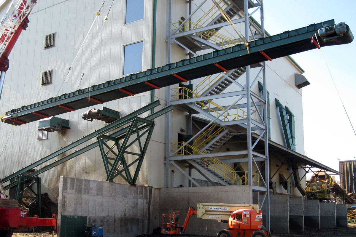 Moving a conveyor into position at the new facility