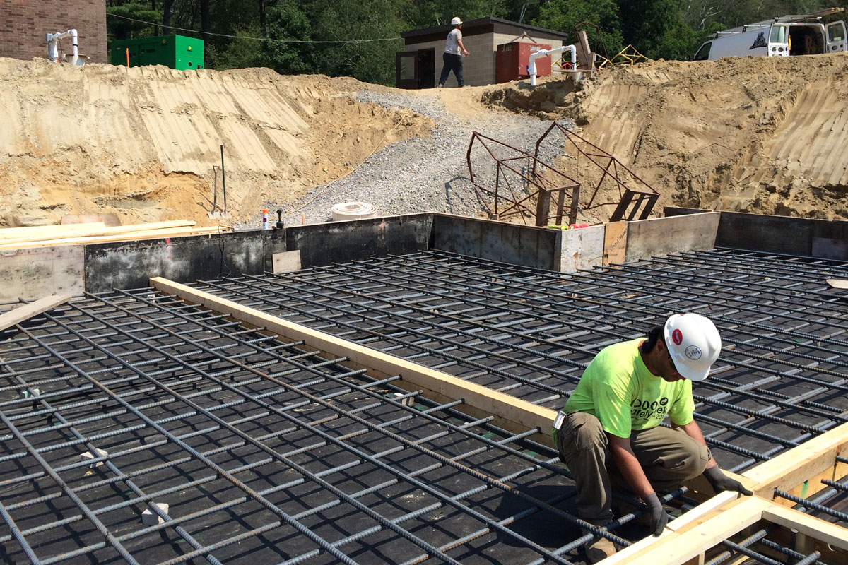 Creating the concrete forms for the foundation of the new building